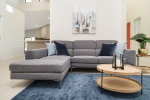 modern designed living area with L shaped sofa